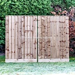 Pair of closed board driveway gates
