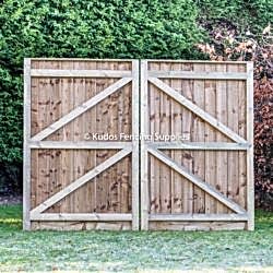 Pair of wooden driveway framed gates