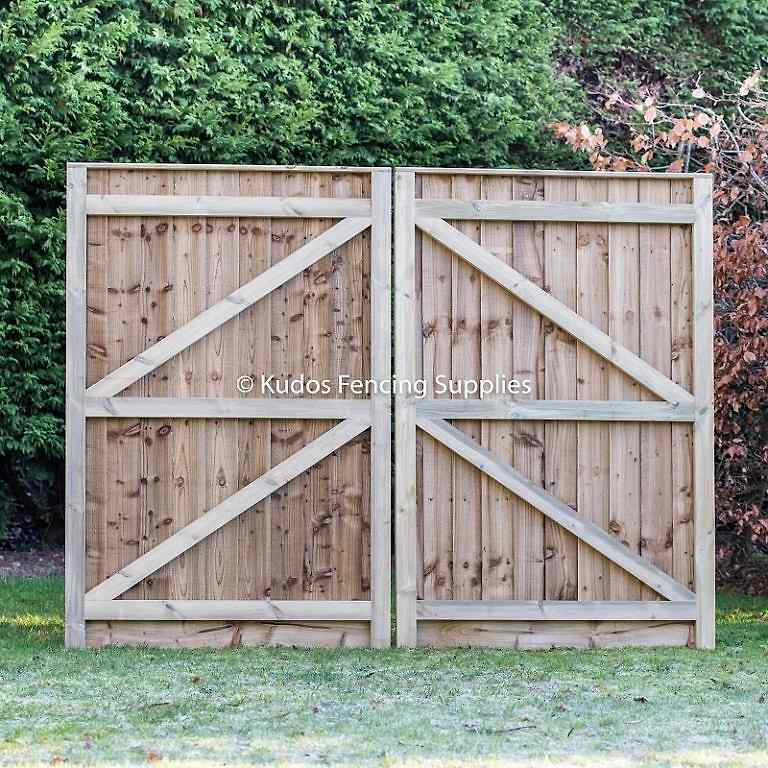 Pair of wooden driveway framed gates