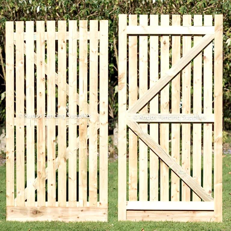 Wooden palisade gate. Garden side gates.