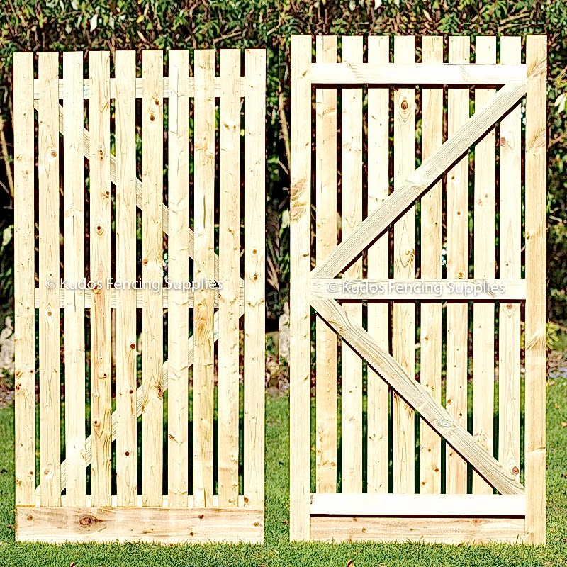 Wooden palisade gate. Garden side gates.