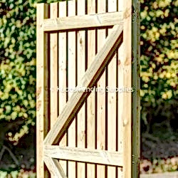 Timber palisade gate