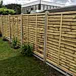 Lap panels with concrete posts fence panels