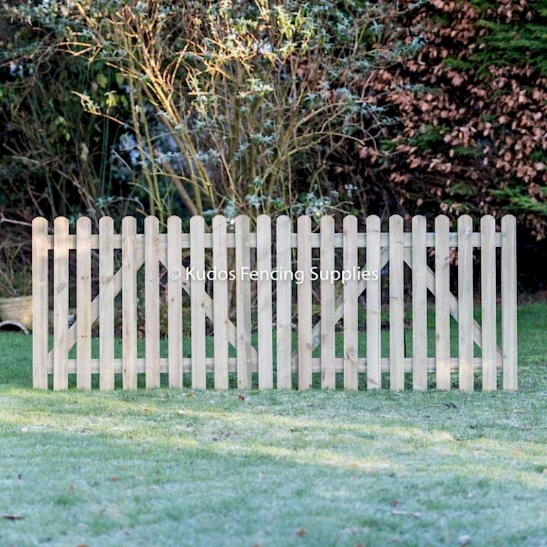 Pair of wooden picket gates. Round, pointed or flat top.