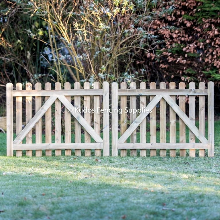Pair of round top picket gates