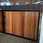 Steel framed gates with wooden inserts