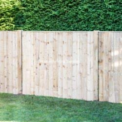 Closed board fence panels with timber posts